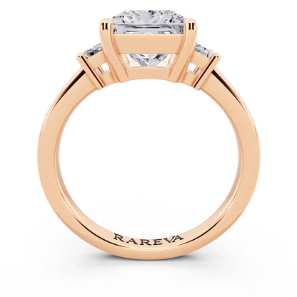 14 KT Rose Gold Princess Cut Diamond Three Stone Emerald Accent Ring - through finger
