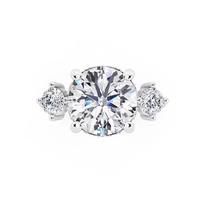Platinum Round Cut Diamond Three Stone Engagement Ring with Hidden Halo - top angle