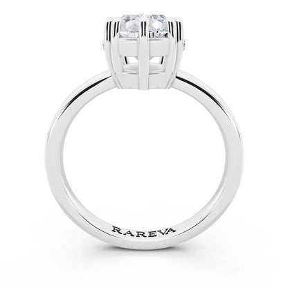 Platinum Pear Cut Diamond Solitaire Ring with Hidden Accent Basket - through finger