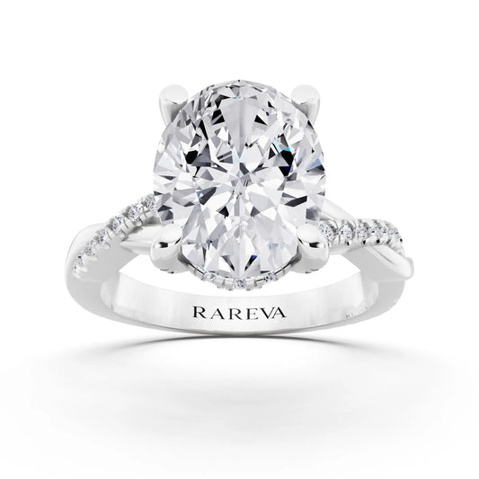 18 KT White Gold Oval Cut Diamond Hidden Halo Ring with Twisted Pave Band - front view