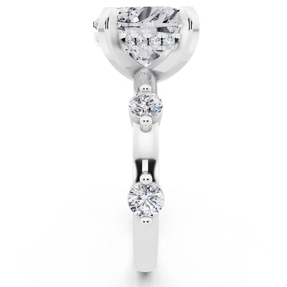 18 KT White Gold Heart Cut Diamond Solitaire Ring with Floating Diamond Accents - side view
