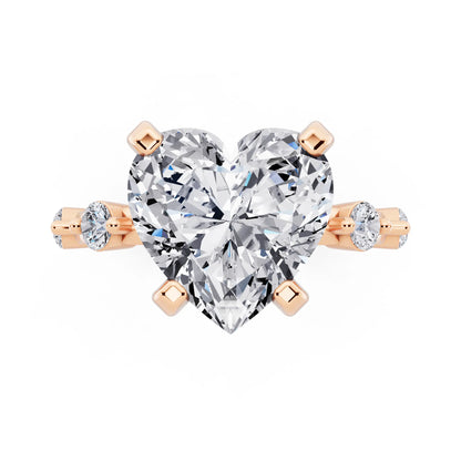 14 KT Rose Gold Heart Cut Diamond Solitaire Ring with Floating Diamond Accents - top angle