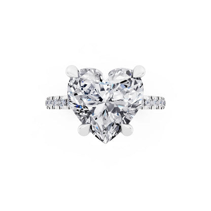 Platinum Heart Cut Diamond Solitaire Ring with Round Pavé Band and Prong Setting - top angle