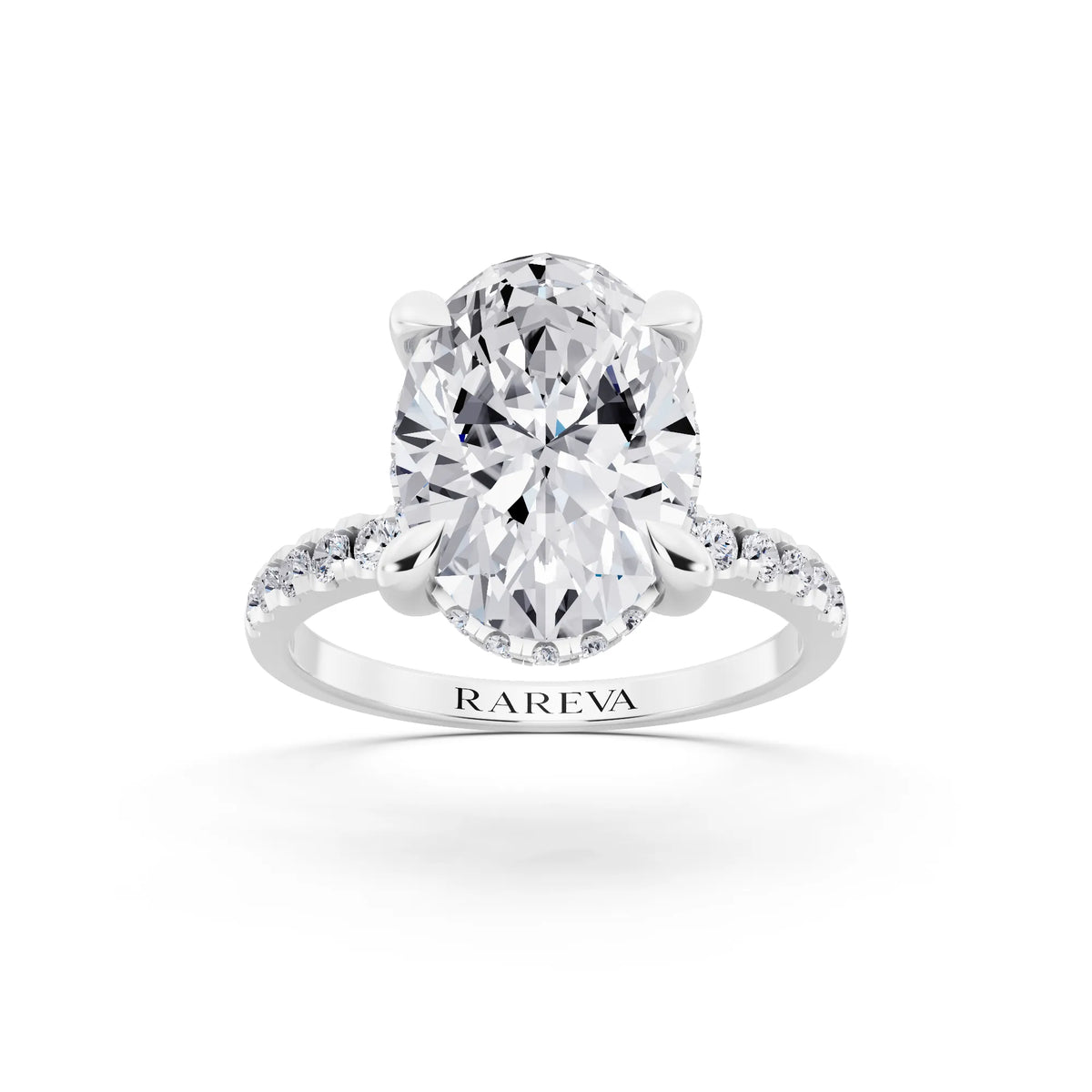 14 KT White Gold Oval Cut Diamond Solitaire Ring with Round Pavé Band and Prong Setting - front view