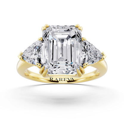 18 KT Yellow Gold Emerald Cut Diamond Three Stone Ring with Trillion Accents - front view