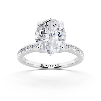 18 KT White Gold Oval Cut Diamond Solitaire Ring with Marquise Collar - front view