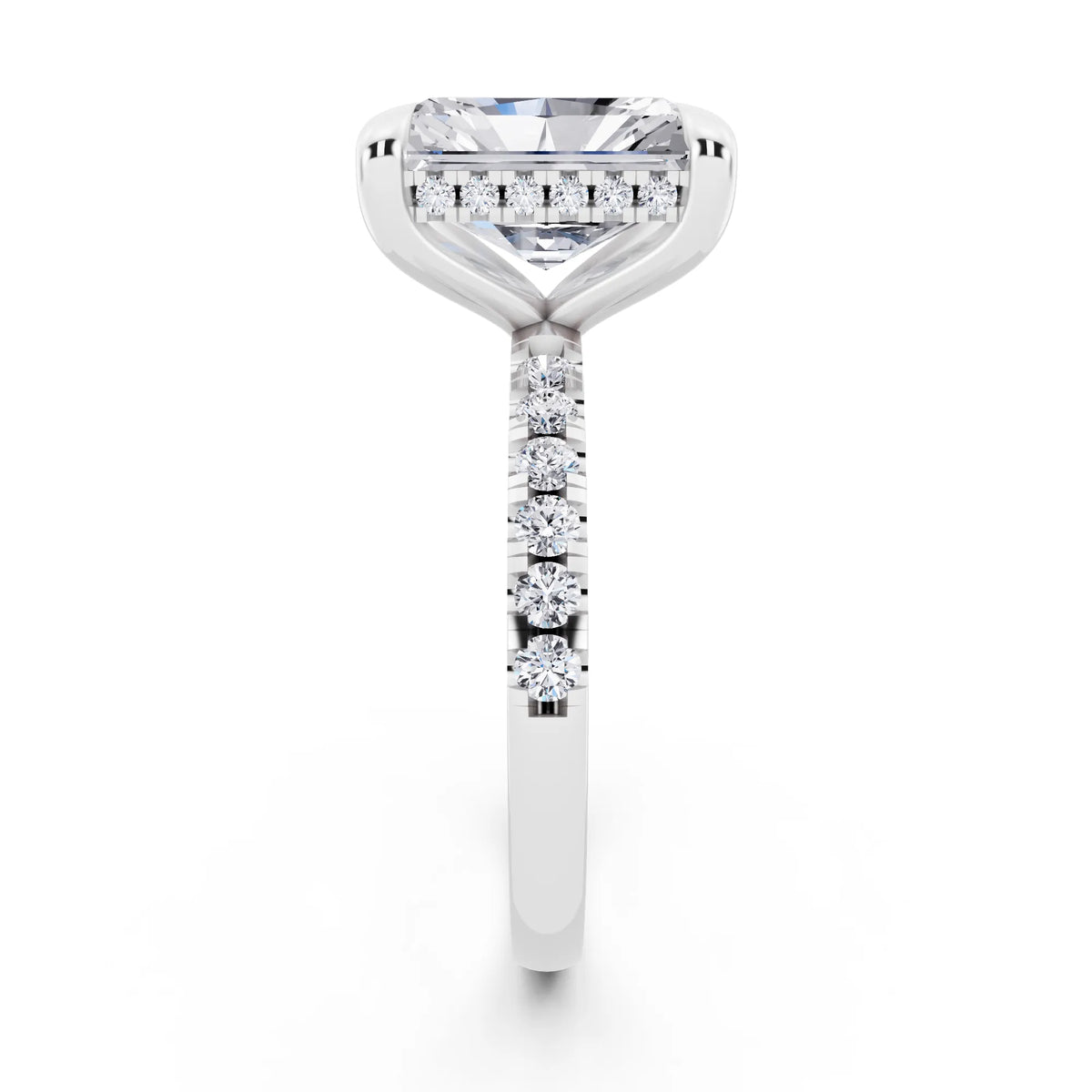 Platinum Radiant Cut Diamond Solitaire Ring with Round Pavé Band and Prong Setting - side view