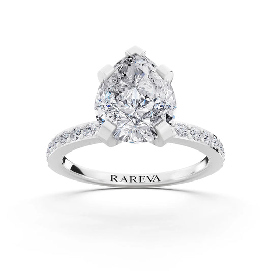 18 KT White Gold Pear Cut Diamond Solitaire Ring with Pave Shank - front view