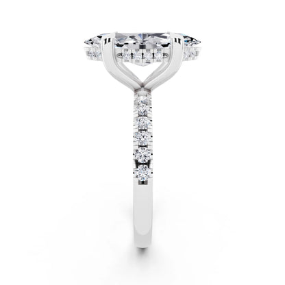 18 KT White Gold Marquise Cut Diamond Solitaire Ring with Round Pavé Band and Prong Setting - side view