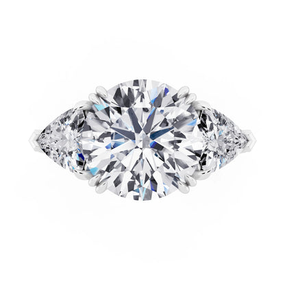 18 KT White Gold Round Cut Diamond Three Stone Ring with Trillion Accents - top angle