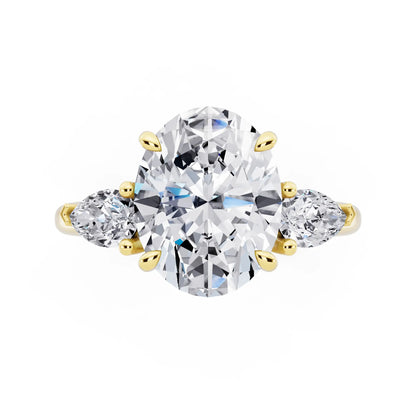 18 KT Yellow Gold Oval Cut Diamond Three Stone Pear Accent Ring - top angle