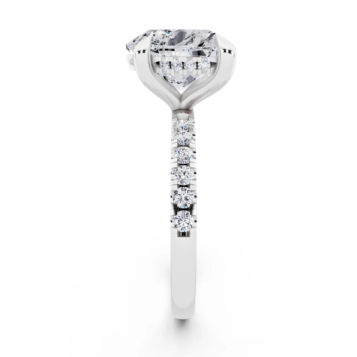 18 KT White Gold Heart Cut Diamond Solitaire Ring with Round Pavé Band and Prong Setting - side view