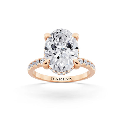 14 KT Rose Gold Oval Cut Diamond Solitaire Ring with Round Pavé Band and Prong Setting - front view