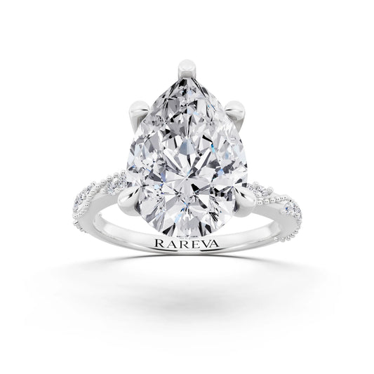 18 KT White Gold Pear Cut Diamond Ring with Marquise Accent - front view