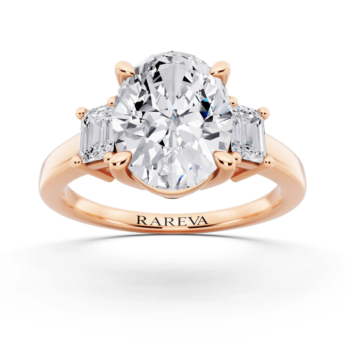 18 KT Rose Gold Oval Cut Diamond Three Stone Emerald Accent Ring - front view