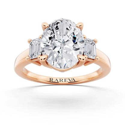 18 KT Rose Gold Oval Cut Diamond Three Stone Emerald Accent Ring - front view
