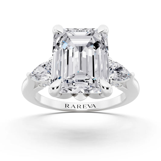 Platinum Emerald Cut Diamond Cluster Engagement Ring with Pear Accents and Pavé Band - front view