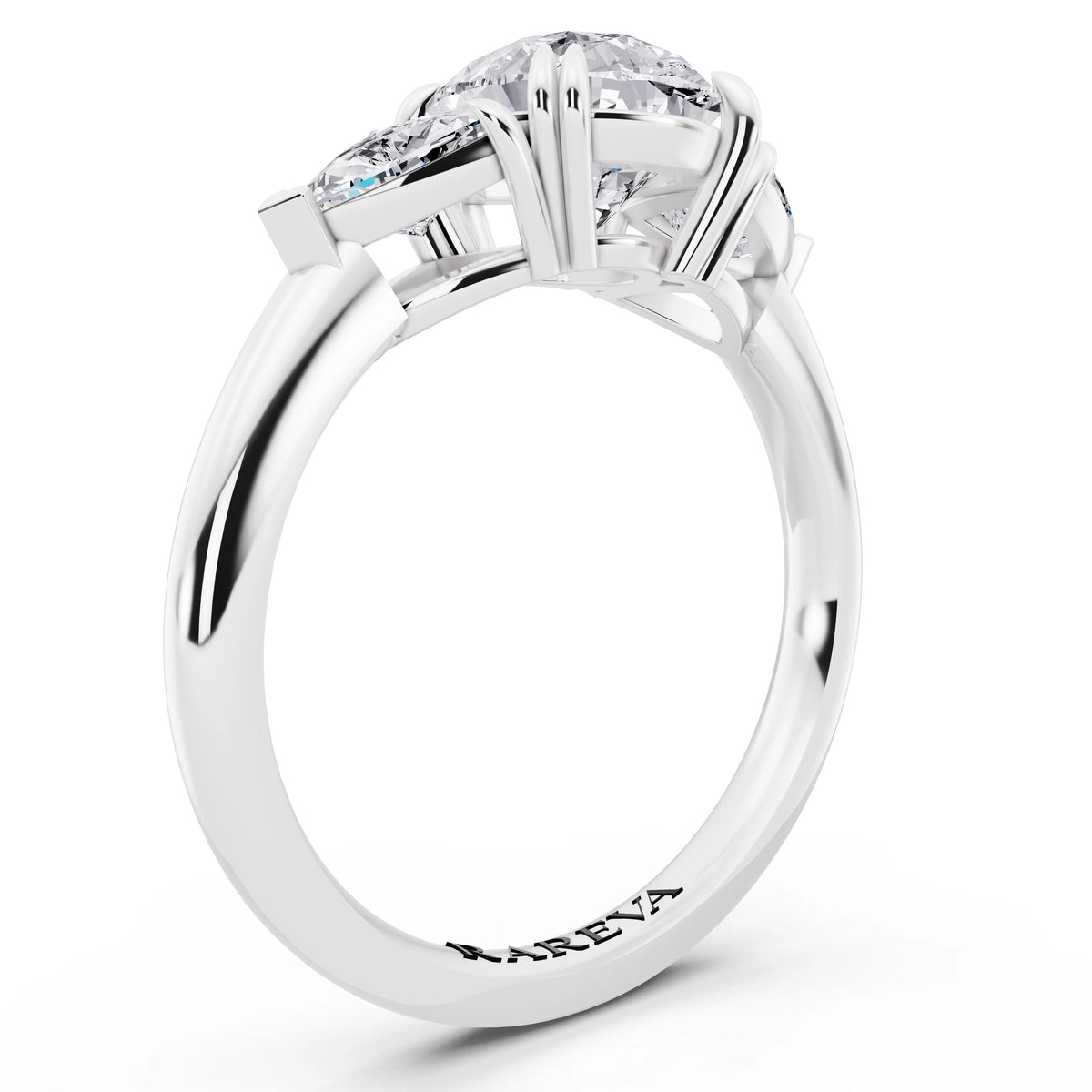 18 KT White Gold Pear Cut Diamond Three Stone Ring with Trillion Accents - top view