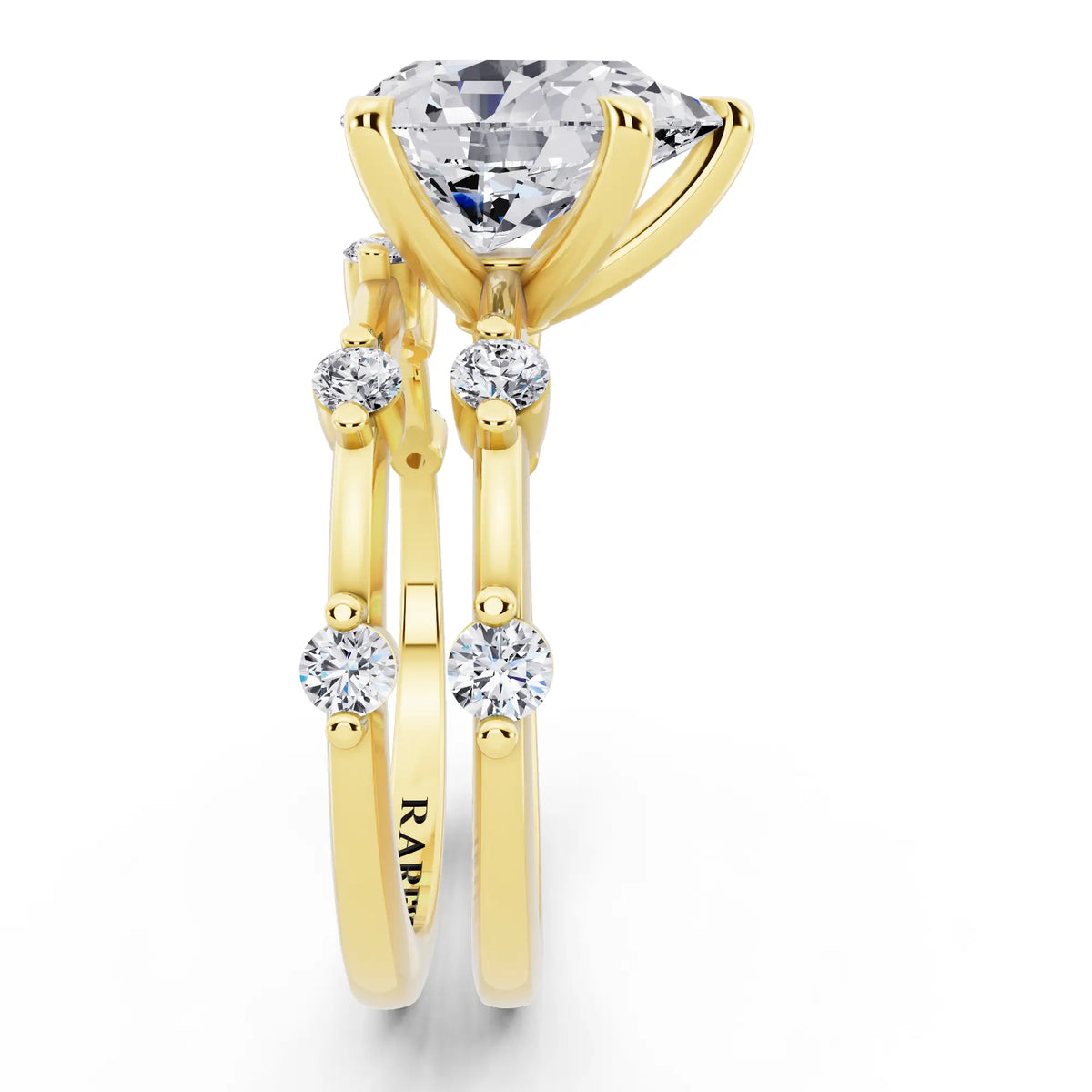 14 KT Yellow Gold Pear Cut Diamond Ring with Floating Accent Band - side view