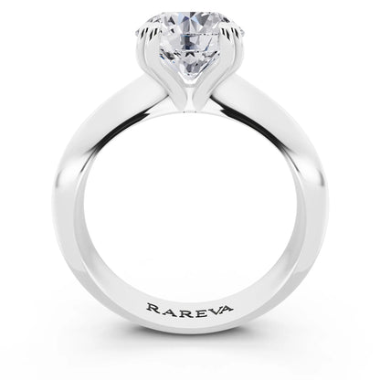 Platinum Round Cut Diamond Solitaire Ring with Knife Edge Band - through finger