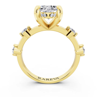 18 KT Yellow Gold Marquise Cut Diamond Solitaire Ring with Floating Diamond Accents - through finger