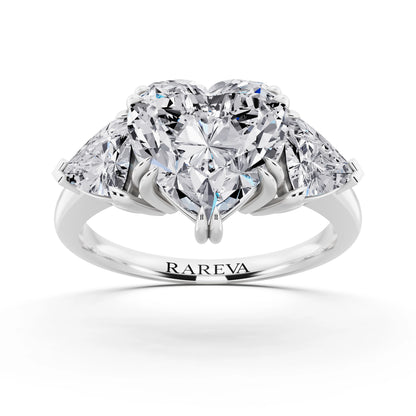 18 KT White Gold Heart Cut Diamond Three Stone Ring with Trillion Accents - front view
