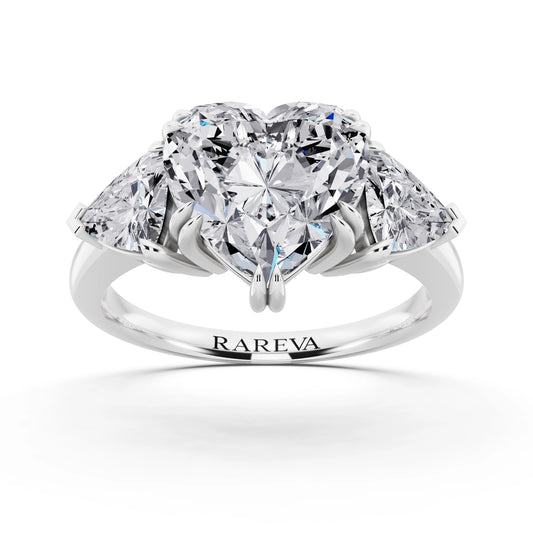 18 KT White Gold Heart Cut Diamond Three Stone Ring with Trillion Accents - front view