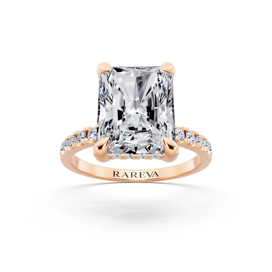 18 KT Rose Gold Radiant Cut Diamond Solitaire Ring with Round Pavé Band and Prong Setting - front view
