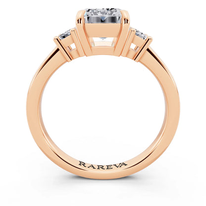 18 KT Rose Gold Emerald Cut Diamond Three Stone Emerald Accent Ring - through finger