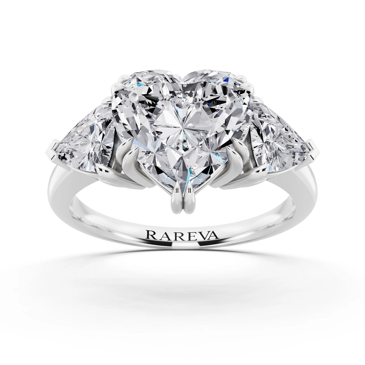 Platinum Heart Cut Diamond Three Stone Ring with Trillion Accents - front view