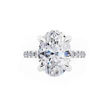 18 KT White Gold Oval Cut Diamond Solitaire Ring with Round Pavé Band and Prong Setting - top angle