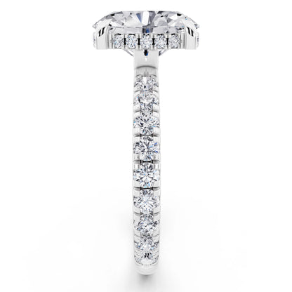 18 KT White Gold Oval Cut Diamond Solitaire Ring with Hidden Halo and French Pave Band - side view