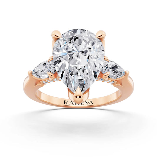 18 KT Rose Gold Pear Cut Diamond Cluster Engagement Ring with Pear Accents and Pavé Band - front view