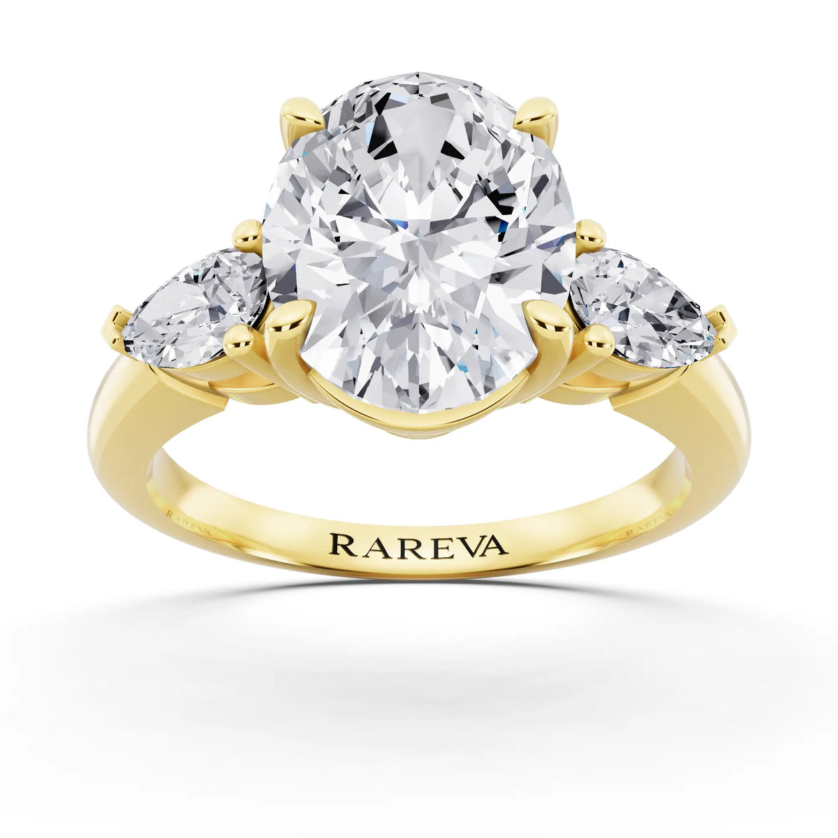18 KT Yellow Gold Oval Cut Diamond Three Stone Pear Accent Ring - front view