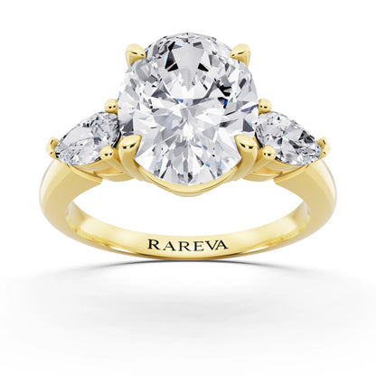 18 KT Yellow Gold Oval Cut Diamond Three Stone Pear Accent Ring - front view
