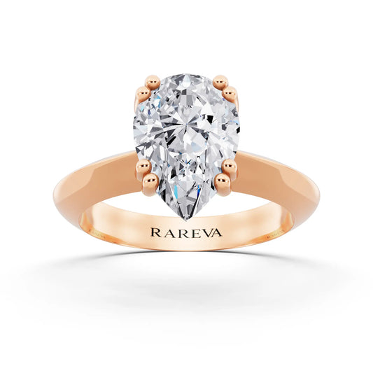 14 KT Rose Gold Pear Cut Diamond Solitaire Ring with Knife Edge Band - front view