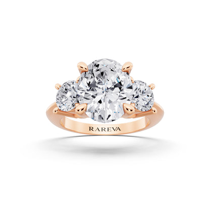 18 KT Rose Gold Oval Cut Diamond Three Stone Ring with Round Accents - front view