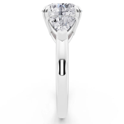 Platinum Round Cut Diamond Three Stone Ring with Trillion Accents - side view