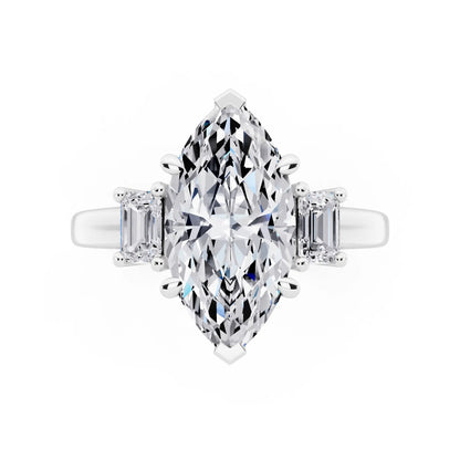 Platinum Marquise Cut Diamond Three Stone Emerald Accent Ring - top angle