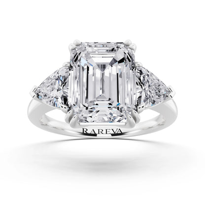 18 KT White Gold Emerald Cut Diamond Three Stone Ring with Trillion Accents - front view