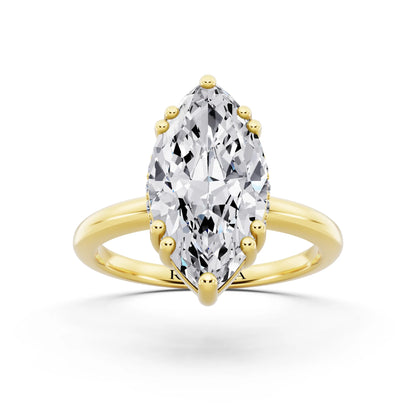14 KT Yellow Gold Marquise Cut Diamond Solitaire Ring with Hidden Accent Basket - front view