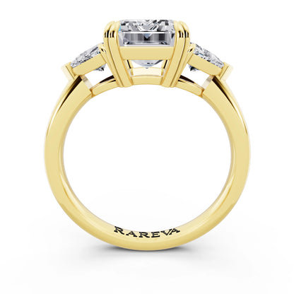 18 KT Yellow Gold Emerald Cut Diamond Three Stone Ring with Trillion Accents - through finger