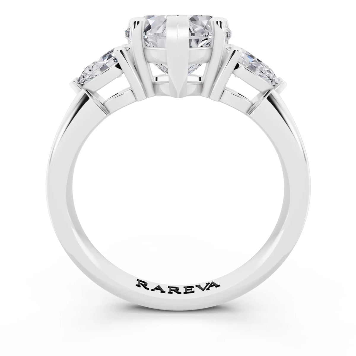 Platinum Heart Cut Diamond Three Stone Pear Accent Ring - through finger
