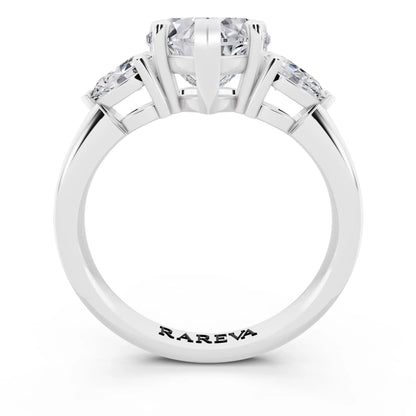 Platinum Heart Cut Diamond Three Stone Pear Accent Ring - through finger