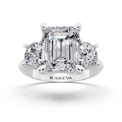 Platinum Emerald Cut Diamond Three Stone Ring with Round Accents - front view