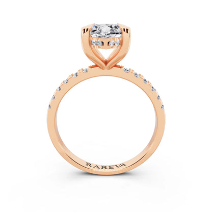 18 KT Rose Gold Marquise Cut Diamond Solitaire Ring with Round Pavé Band and Prong Setting - through finger
