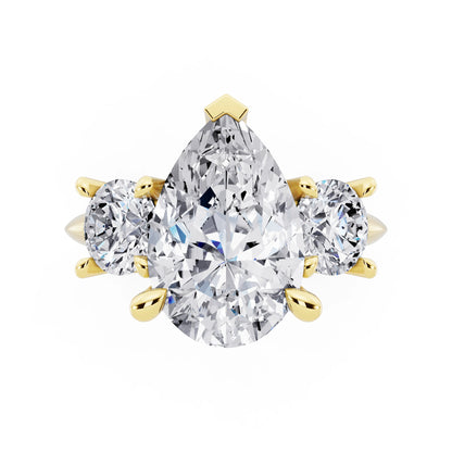 18 KT Yellow Gold Pear Cut Diamond Three Stone Ring with Round Accents - top angle