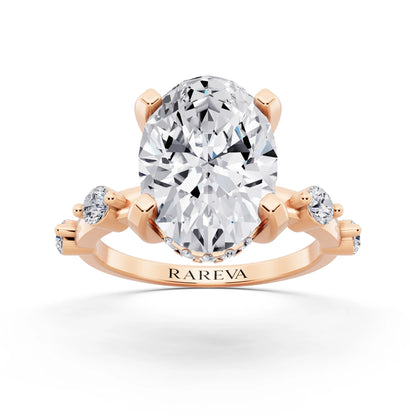 14 KT Rose Gold Oval Cut Diamond Solitaire Ring with Floating Diamond Accents - front view