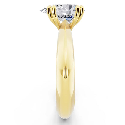 18 KT Yellow Gold Pear Cut Diamond Solitaire Ring with Knife Edge Band - side view