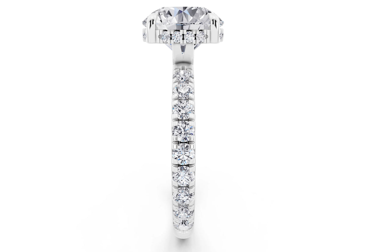 18 KT White Gold Round Cut Diamond Solitaire Ring with Hidden Halo and French Pave Band - side view